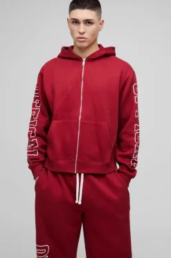 Shop boohooMAN Oversized Boxy Official Zip Through Hooded Tracksuit burgundy