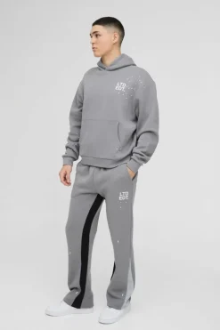 Store boohooMAN Oversized Boxy Paint Splatter Gusset Hooded Tracksuit charcoal