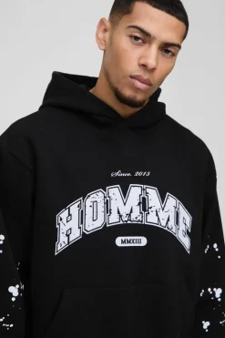 Online boohooMAN Oversized Boxy Paint Splatter Homme Hoodie black