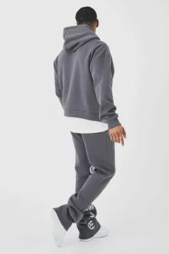 Shop boohooMAN Oversized Boxy Printed Flared Tracksuit grey