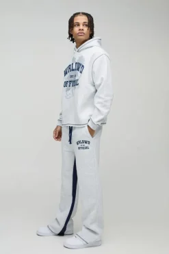 Store boohooMAN Oversized Boxy Varsity Worldwide Printed Raw Hem Flare Hooded Tracksuit grey