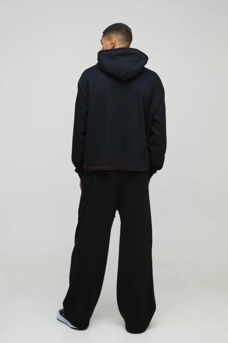 New boohooMAN Oversized Boxy Varsity Worldwide Printed Raw Hem Hoodie black