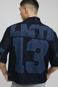 Shop boohooMAN Oversized Boxy V Neck Laser Print Football Top indigo