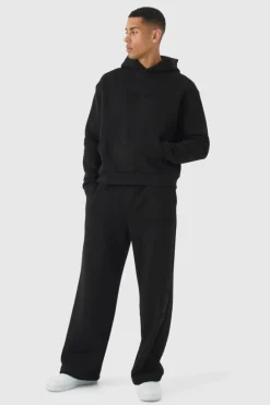 Store boohooMAN Oversized Boxy Worldwide Emboss Wide Leg Tracksuit black