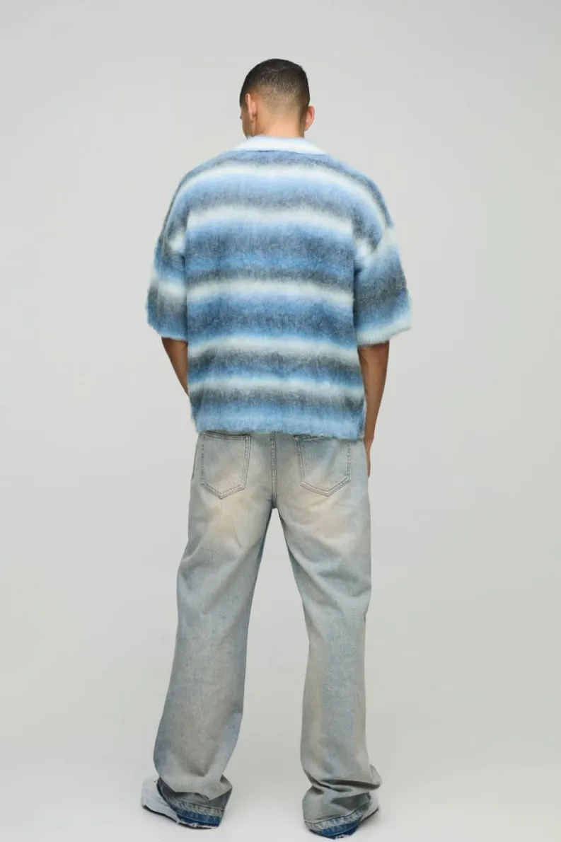 Shop boohooMAN Oversized Brushed Stripe Short Sleeve Knitted Polo blue