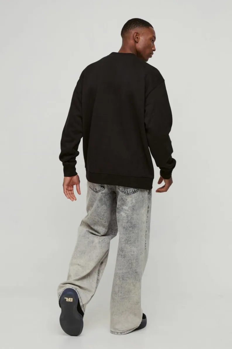 Shop boohooMAN Oversized Cherry Lips Box Graphic Sweatshirt black