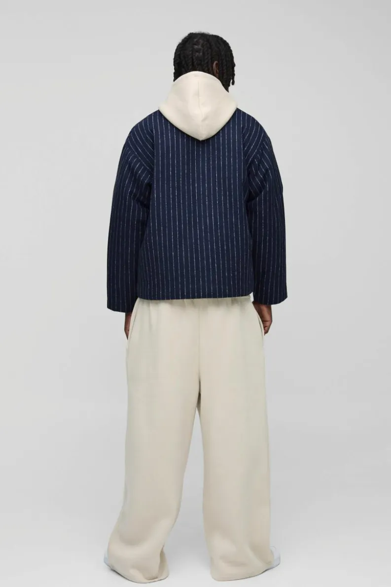 Shop boohooMAN Oversized Collarless Stripe Baseball Varsity Jacket navy