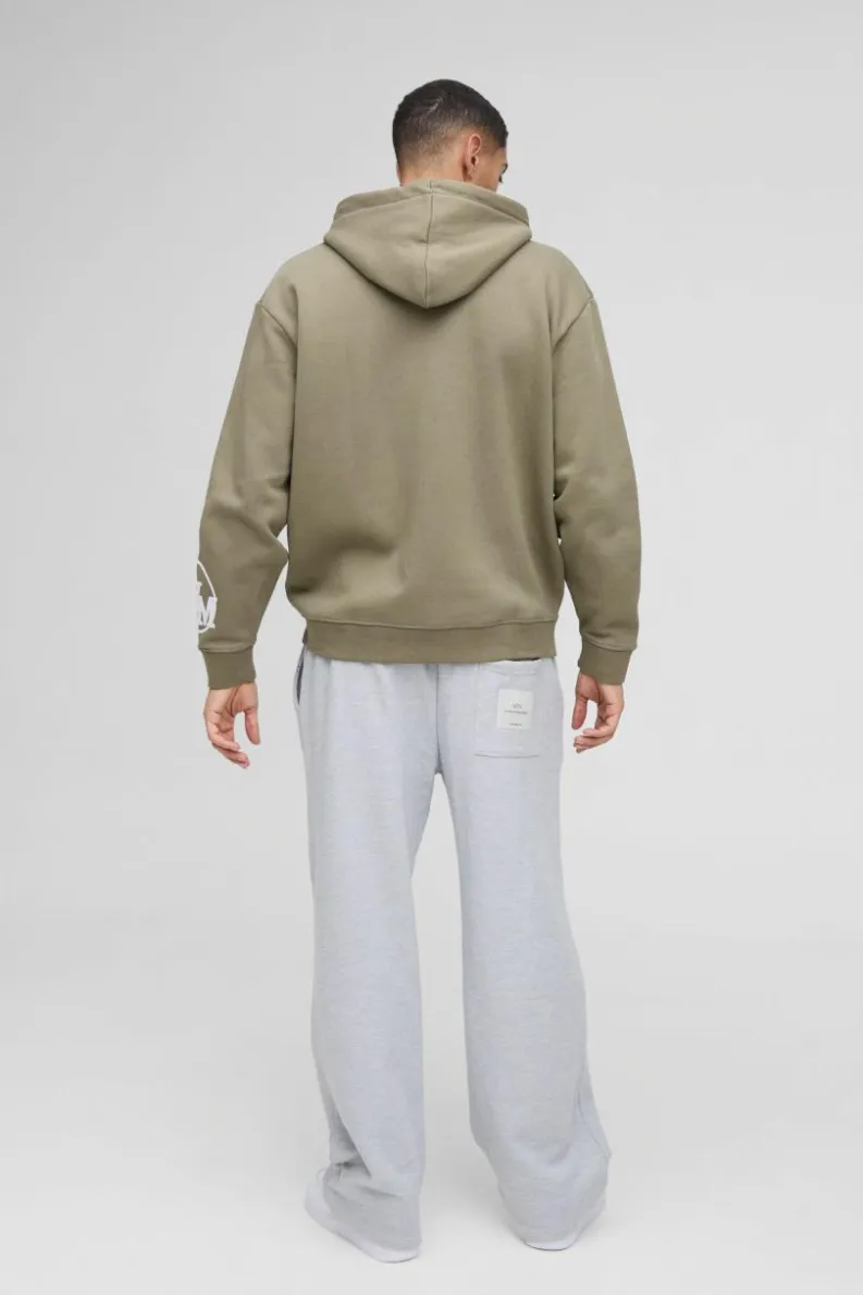 Shop boohooMAN Oversized Dept Homme Rope Drawcord Hoodie khaki