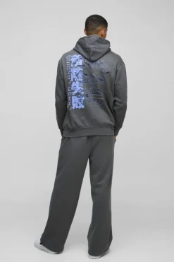 Shop boohooMAN Oversized Disney Lilo and Stitch License Print Hoodie charcoal
