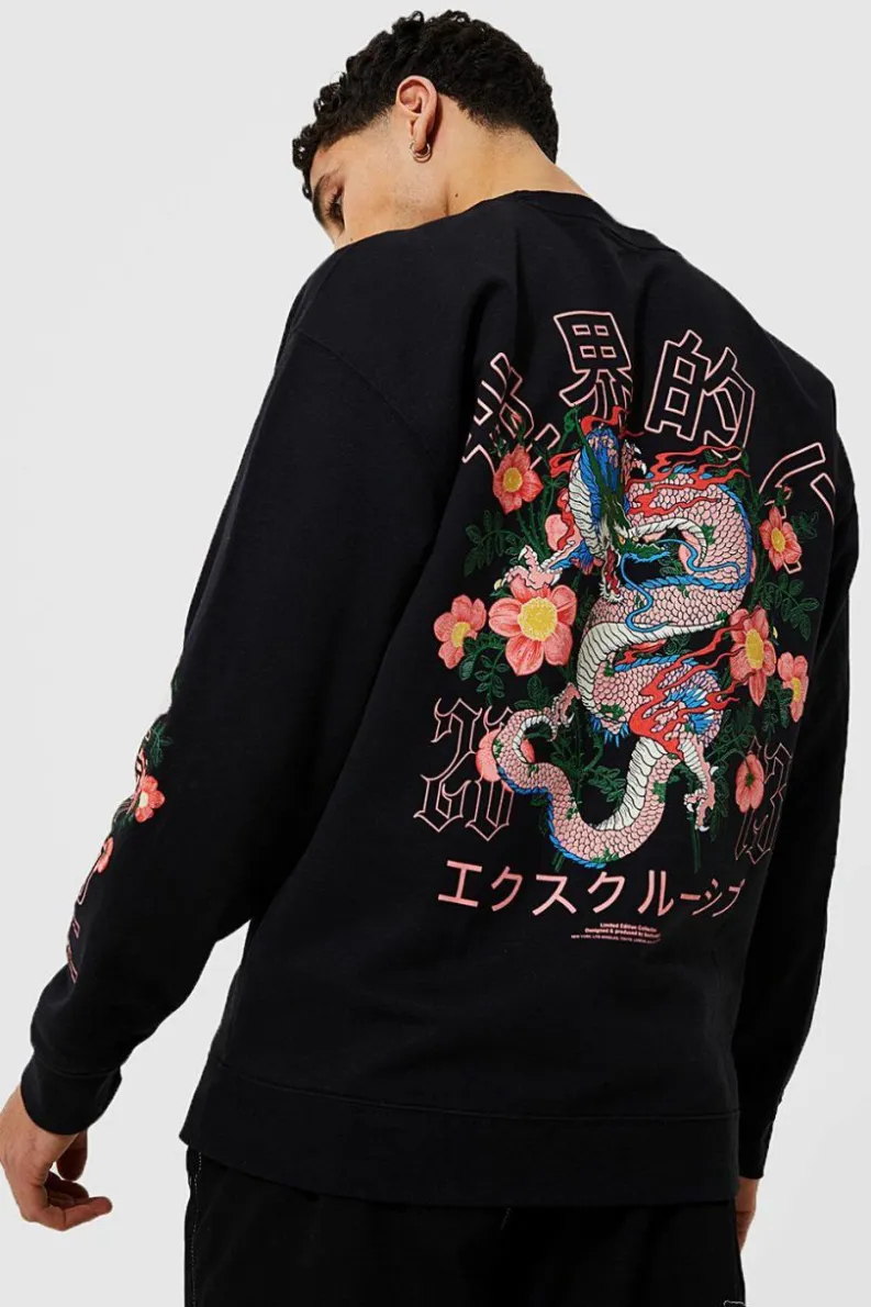 Shop boohooMAN Oversized Dragon Floral Graphic Sweatshirt black