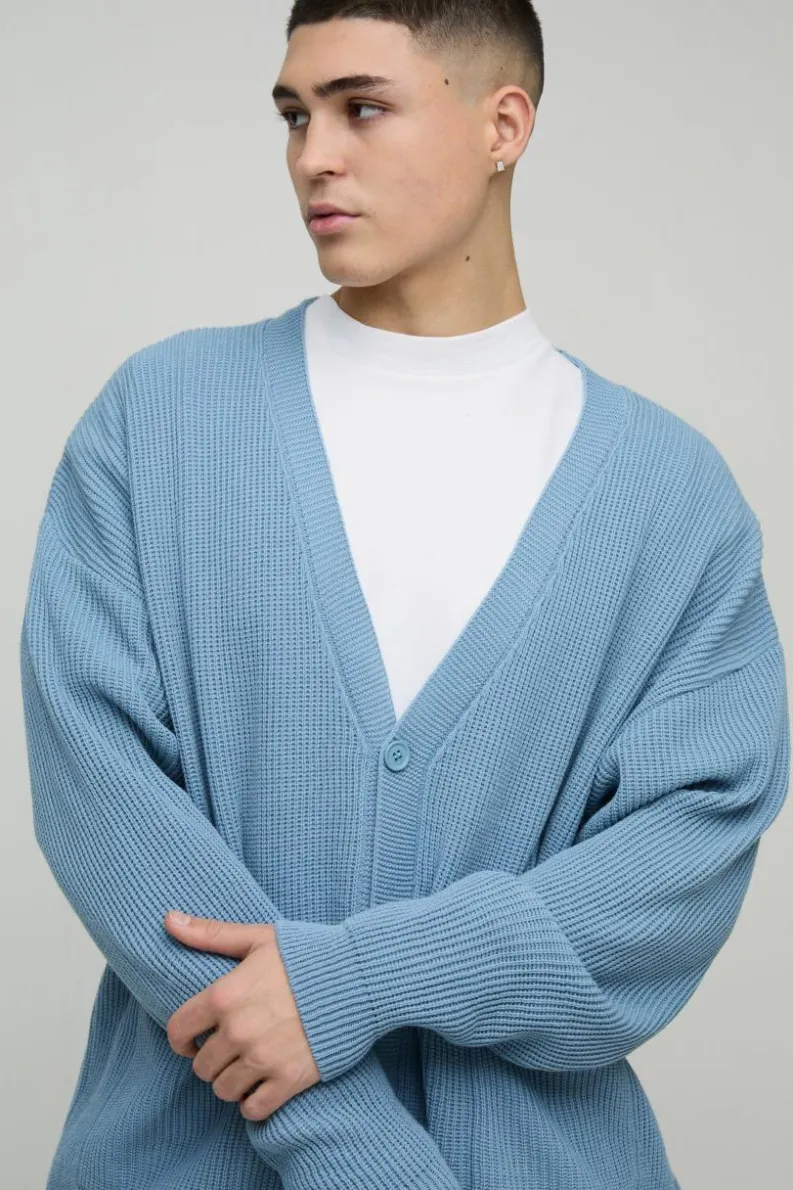 Store boohooMAN Oversized Dropped Shoulder Ribbed Knitted Cardigan light blue