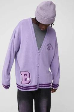 Shop boohooMAN Oversized Drop Shoulder Varsity Applique Knitted Cardigan purple