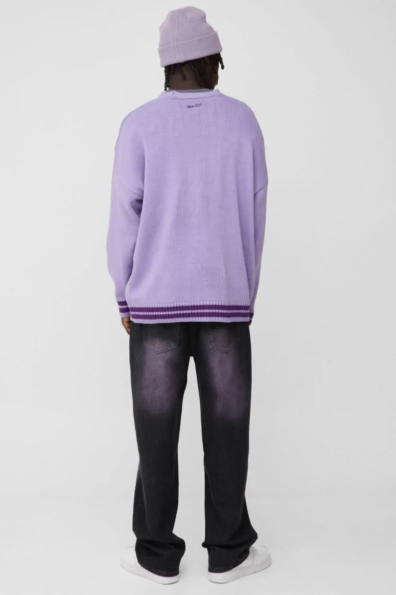 Shop boohooMAN Oversized Drop Shoulder Varsity Applique Knitted Cardigan purple