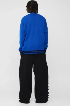 Discount boohooMAN Oversized Drop Shoulder Varsity Applique Knitted Cardigan cobalt