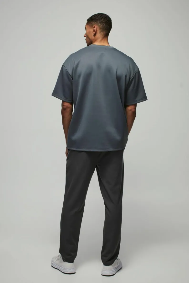 Shop boohooMAN Oversized Extended Neck Scuba T-Shirt slate