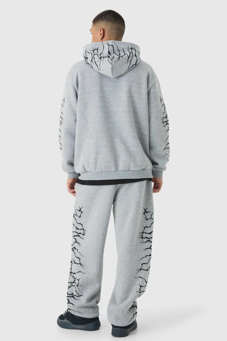 Shop boohooMAN Oversized Graffiti Zip Through Hooded Tracksuit grey marl