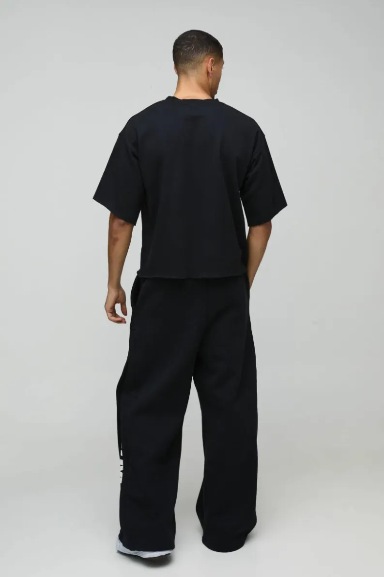 Online boohooMAN Oversized Half Sleeve Raw Hem Nirvana License Print Sweatshirt black