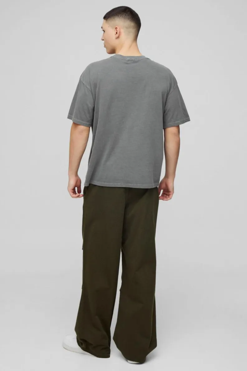 Shop boohooMAN Oversized Homme Magazine Graphic Washed T-Shirt charcoal