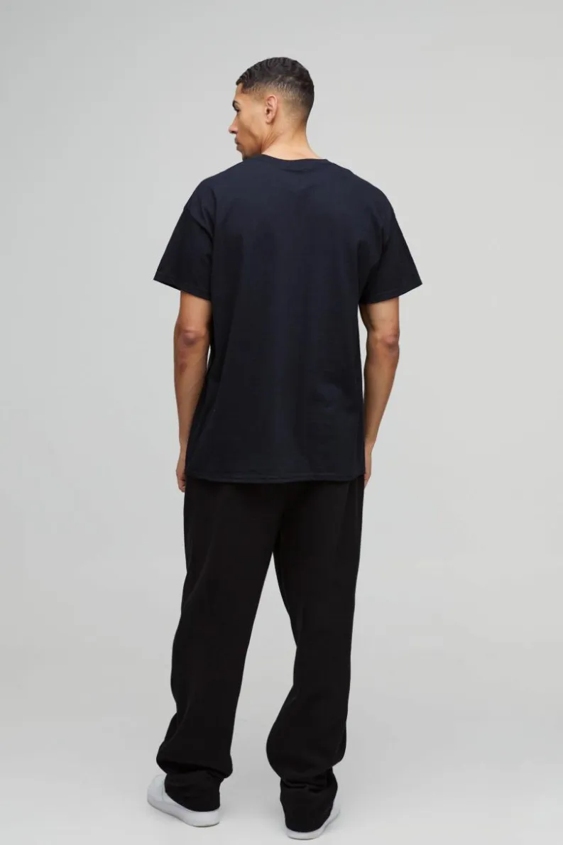Shop boohooMAN Oversized Nirvana Floral Heart License T-Shirt black