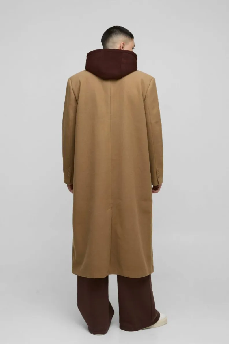 Store boohooMAN Oversized Overcoat With Faux Hooded Jersey Layer In tan