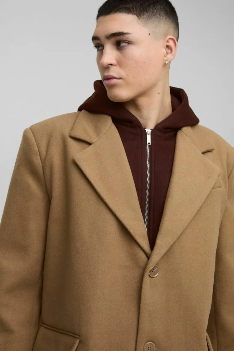 Store boohooMAN Oversized Overcoat With Faux Hooded Jersey Layer In tan