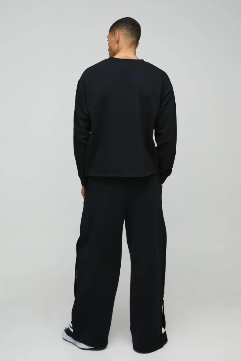 New boohooMAN Oversized Prince Raw Hem License Print Sweatshirt black