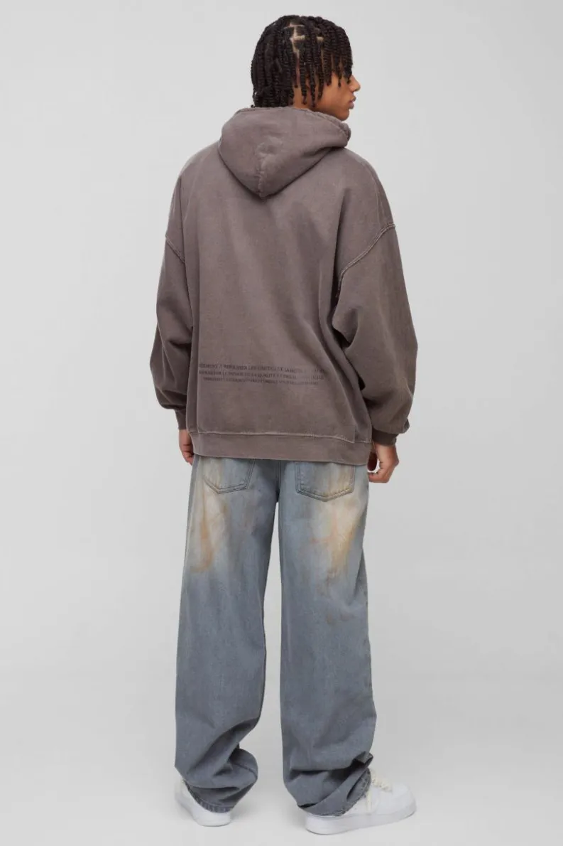 Shop boohooMAN Oversized Renaissance Box Graphic Washed Hoodie dark brown