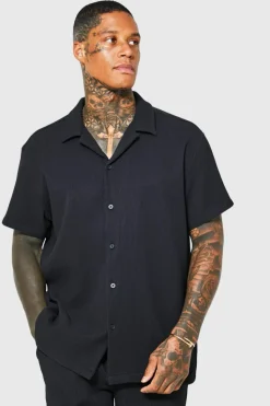 Shop boohooMAN Oversized Short Sleeve Pleated Shirt And Short black