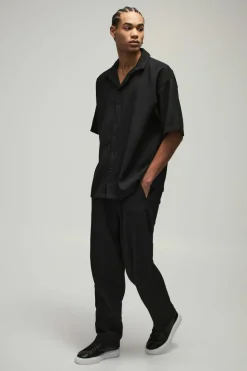 Shop boohooMAN Oversized Short Sleeve Pleated Shirt & Relaxed Fit Trouser black