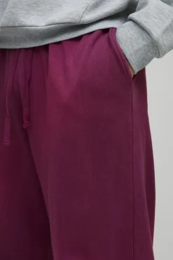 Clearance boohooMAN Oversized Spray Wash Jogger burgundy