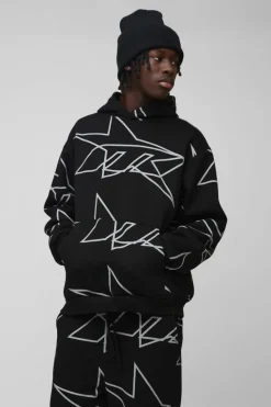 Online boohooMAN Oversized Star All Over Printed Gusset Flare Hooded Tracksuit black