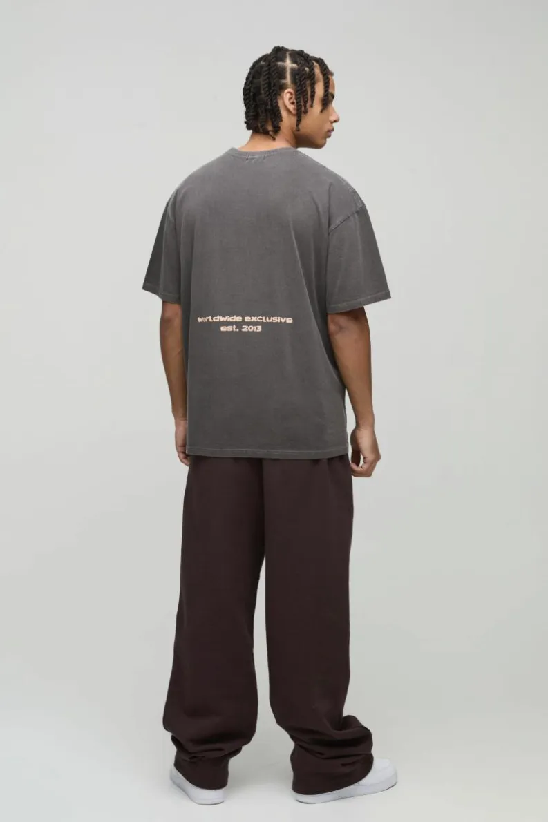 Shop boohooMAN Oversized Sunset Western Puff Print Washed Graphic T-Shirt brown
