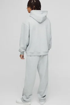 Shop boohooMAN Oversized Worldwide Hoodie grey marl