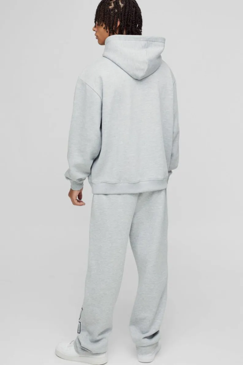 Shop boohooMAN Oversized Worldwide Hoodie grey marl