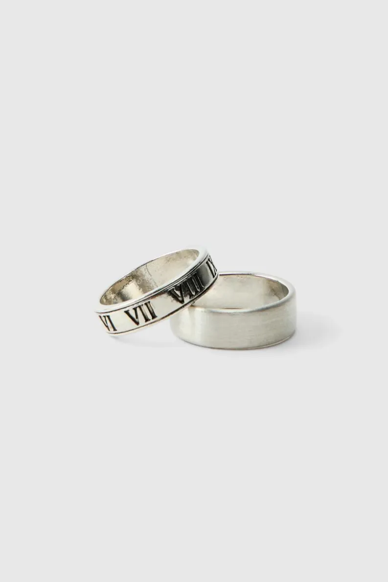 Shop boohooMAN 2 Pack Roman Lettering Rings silver