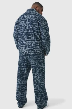 Shop boohooMAN Plus Distressed Tapestry Relaxed Fit Denim Jeans indigo