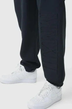 Outlet boohooMAN Plus Oversized MMXIII Embossed Jogger black