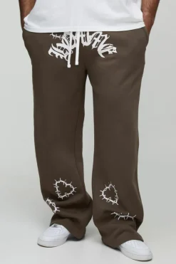 Shop boohooMAN Plus Relaxed Double Waistband Heart Print Jogger brown