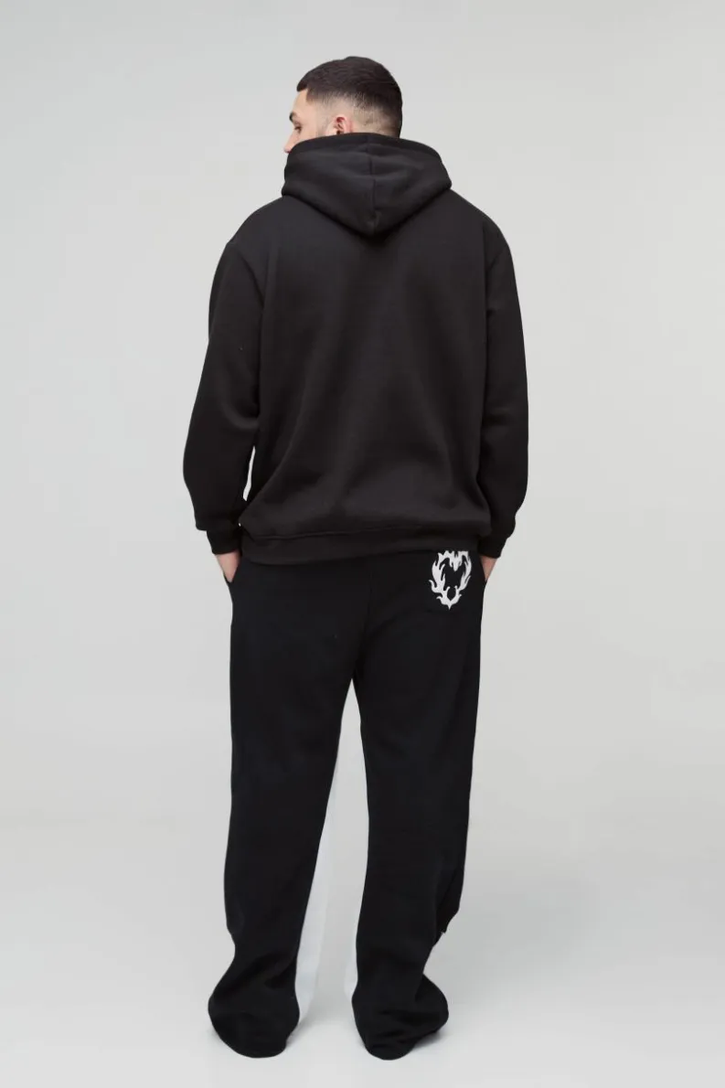 Hot boohooMAN Plus Relaxed Flare Cold Hearted Puff Print Gusset Jogger black