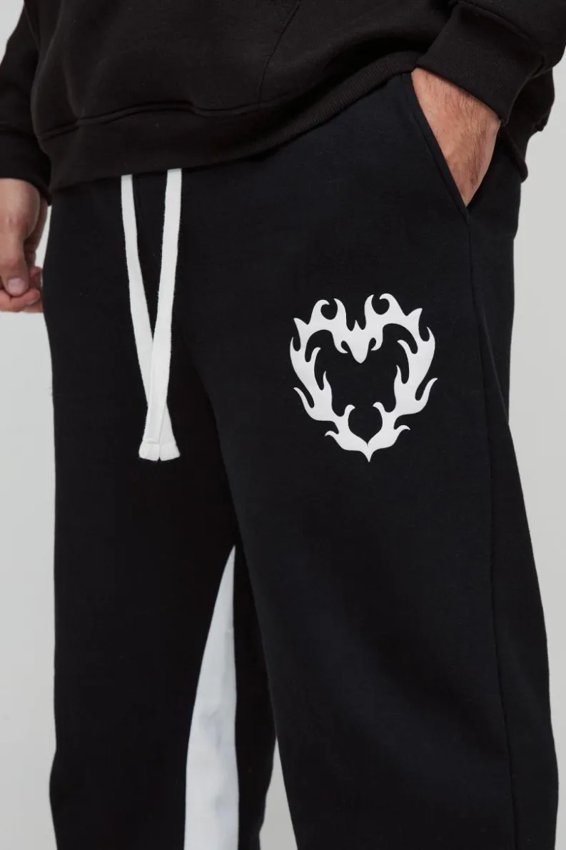 Hot boohooMAN Plus Relaxed Flare Cold Hearted Puff Print Gusset Jogger black