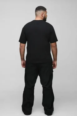 Shop boohooMAN Plus Slim Fit Flare Stacked Trouser With Ruched Detail black