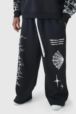 Shop boohooMAN Plus Wide Leg Print Joggers black
