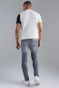 Shop boohooMAN Regular Curved Jacquard Half Zip Knitted Polo ecru