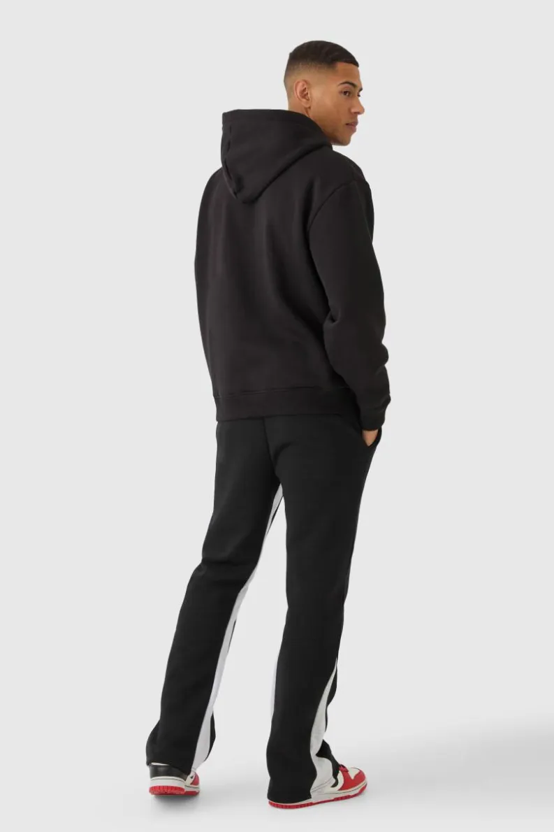 Shop boohooMAN Regular Fit Heart Borg Applique Gusset Jogger black