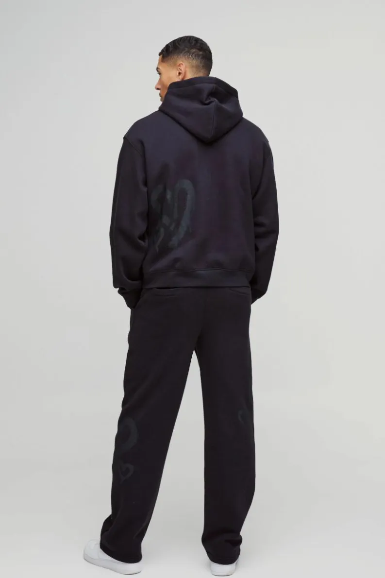 Store boohooMAN Relaxed Fit All Over Heart Printed Jogger black