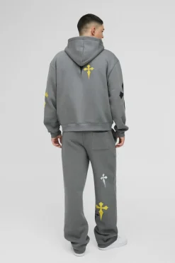Shop boohooMAN Relaxed Fit Cross Embroidered Printed Jogger charcoal