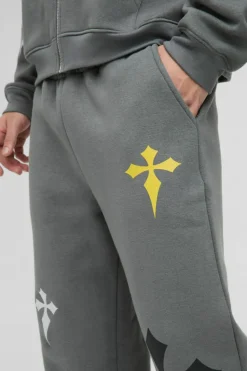 Shop boohooMAN Relaxed Fit Cross Embroidered Printed Jogger charcoal