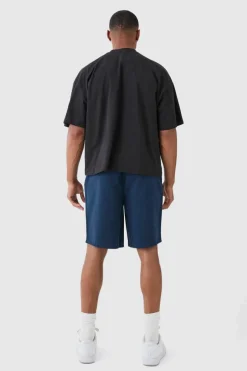 Online boohooMAN Relaxed Fit Elasticated Waist Chino Shorts in navy