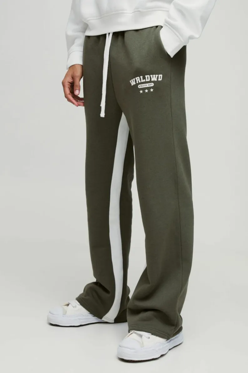 Shop boohooMAN Relaxed Flare Worldwide Star Gusset Jogger khaki