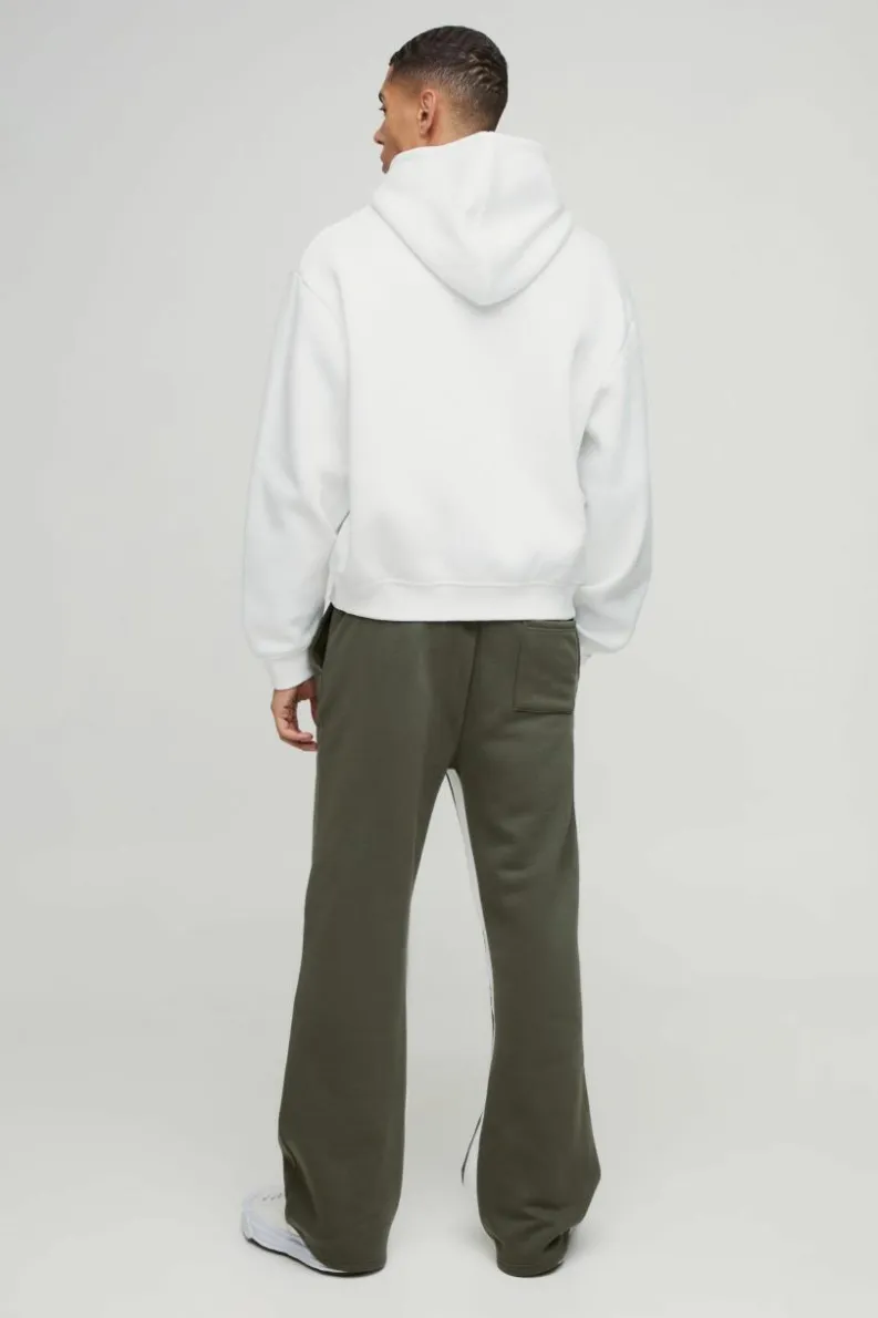 Shop boohooMAN Relaxed Flare Worldwide Star Gusset Jogger khaki
